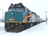 With the holidays coming up, VIA 6429 & VIA 6427 lead a longer than usual VIA 61 as the engineer climbs back into the lead engine at Dorval Station.  For more train photos, check out http://www.flickr.com/photos/mtlwestrailfan/ 
