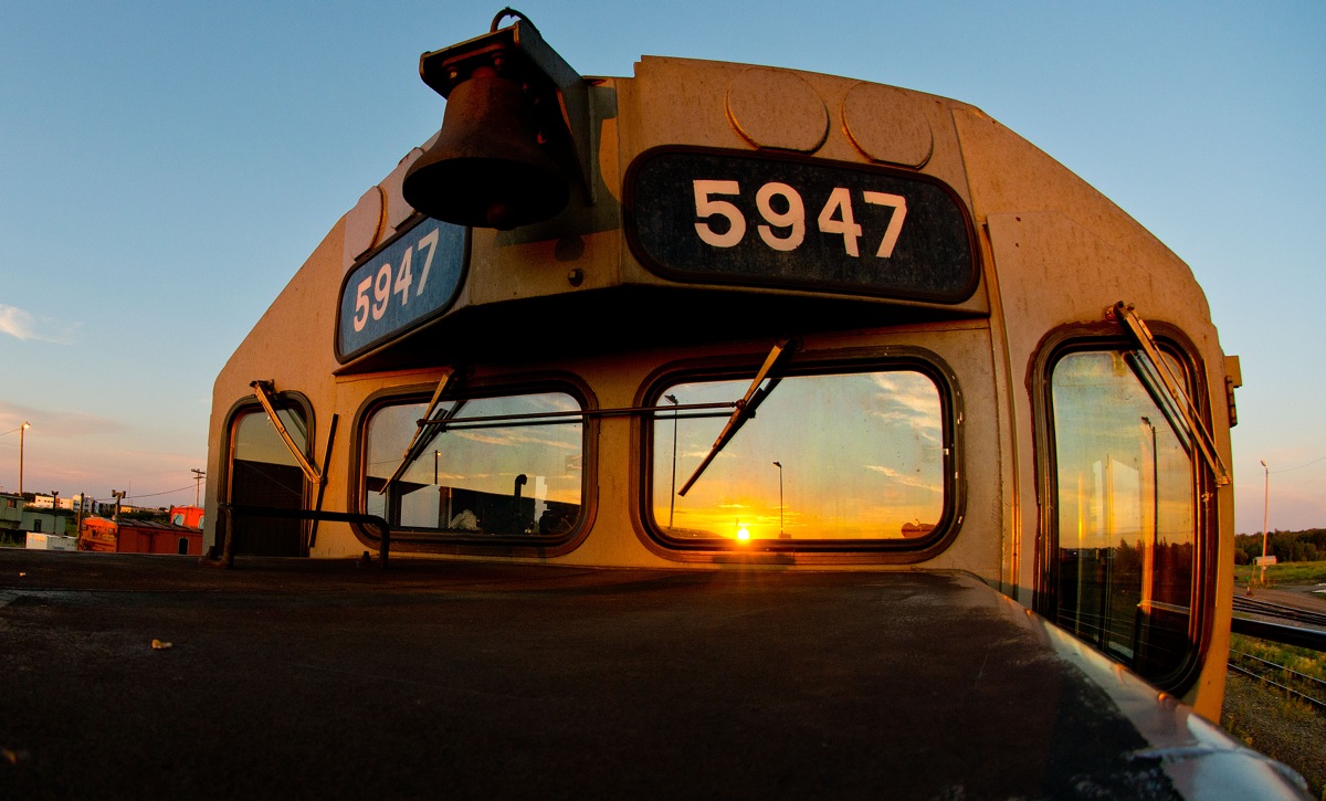 GTW 5947 watches the sun set from the shop track in Fort St John BC.