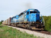 The blue two will soon be no more. On December 10, 2013, GSCX 7362 was delivered to Lambton Diesel Specialist Inc. in Sarnia to be repainted in to Genesee & Wyoming corporate colours. GSCX 7369 and GSCX 7362 are seen throttling up heading east out of Guelph after adhering to the slow order through the City. 