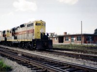 Conrail has come and gone. Erie Lackawanna became part of Conrail the same year this photo was taken, 1976. This was the last time I ever saw any power marked EL enter Canada down at Fort Erie; and, although the image presented here is certainly not of best quality, it is historical non-the-less.The EL 1206 and 1200 are shown heading back to the States after visiting the sprawling Fort Erie CN yard. Extreme left one can see Central Av bridge and on the right, the modern replacement for the old Michigan Central station that was on the opposite side of the tracks here. This flat roofed structure has since been demolished, somewhere around 25 years ago. It had became expendable  after the last run of any passenger train, the CP/TH&B Budds in 1981. [ Editors note: Those who may fret over quality - at the time this was accepted this is the second Erie-Lackawanna Image in the database. We challenge those with E-L images (or any other great classics) to submit them here, please :) ]