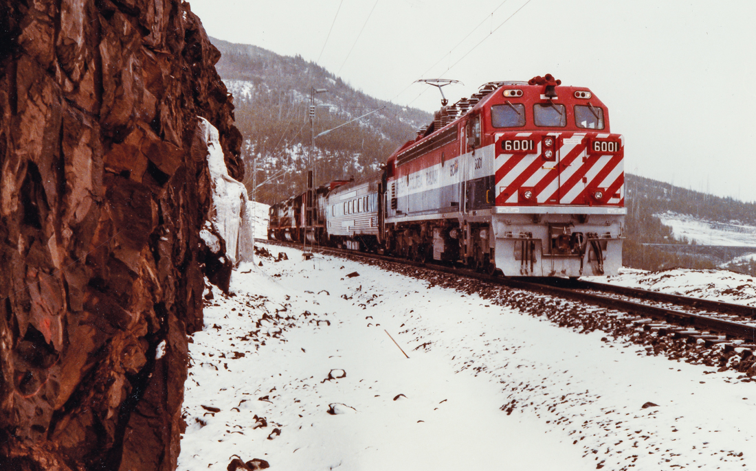 Photo taken by Glen Fisher, my father-in-law. He is is a railway consultant and was involved in the BC Rail Tumbler Ridge electrification during the early 1980s. This shot shows testing of the GF6C locomotives before regular service on the line began. All have since been retired and the line currently uses diesel engines. Behind BCOL 6001 is EMD test car ET840 and behind that are three SD40-2s (1 CN & 2 BC Rail). For another view of this consist click here. Unknown location, please let me know if you have information on the exact location.