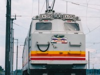 This photo was taken by my father-in-law (Glen Fisher) who was involved in attempting to sell/lease N de M electric locomotives to Montreal's AMT (commuter train agency) for use on the electrified Deux-Montagnes line. The AMT decide not to use them and all were scrapped in 2007. Here one is seen in the AMT's St-Eustache Yard at the end of the Deux-Montagnes line.