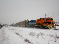 With exams ending late last night today was my first official day of Winter break.  What better of a way to kick it off than a chase of the GEXR.  Here we see GEXR 432 back up to track speed and hauling butt with GEXR 2303 and GSCX 7369.