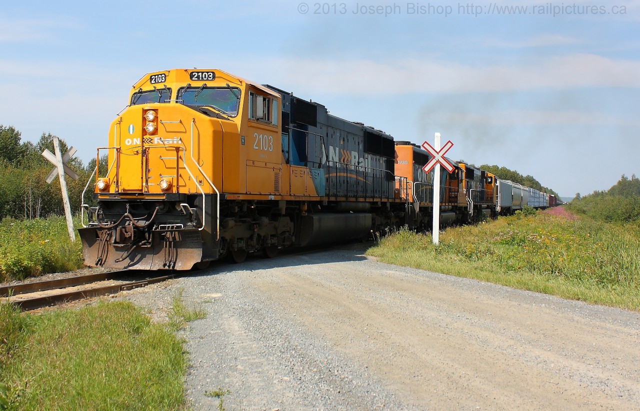 ONR train 214 blasts through the crossing at Kerr's Road just outside of Englehart on my last day there for the summer.