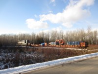 1001 heads back to the yard in Utopia with a pair of cut down gondola cars used for maintenance. The rails have been getting polished every day this week. 