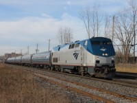 Amtrak loco 4 on rte68 to New York pulling a private car Tioga Pass Baristow California the car was built in 1959 by Canadian National in Pte St-Charles Mtl number 23 and have served in Albertafor the president of Mountain Régions now belong to LA Rail