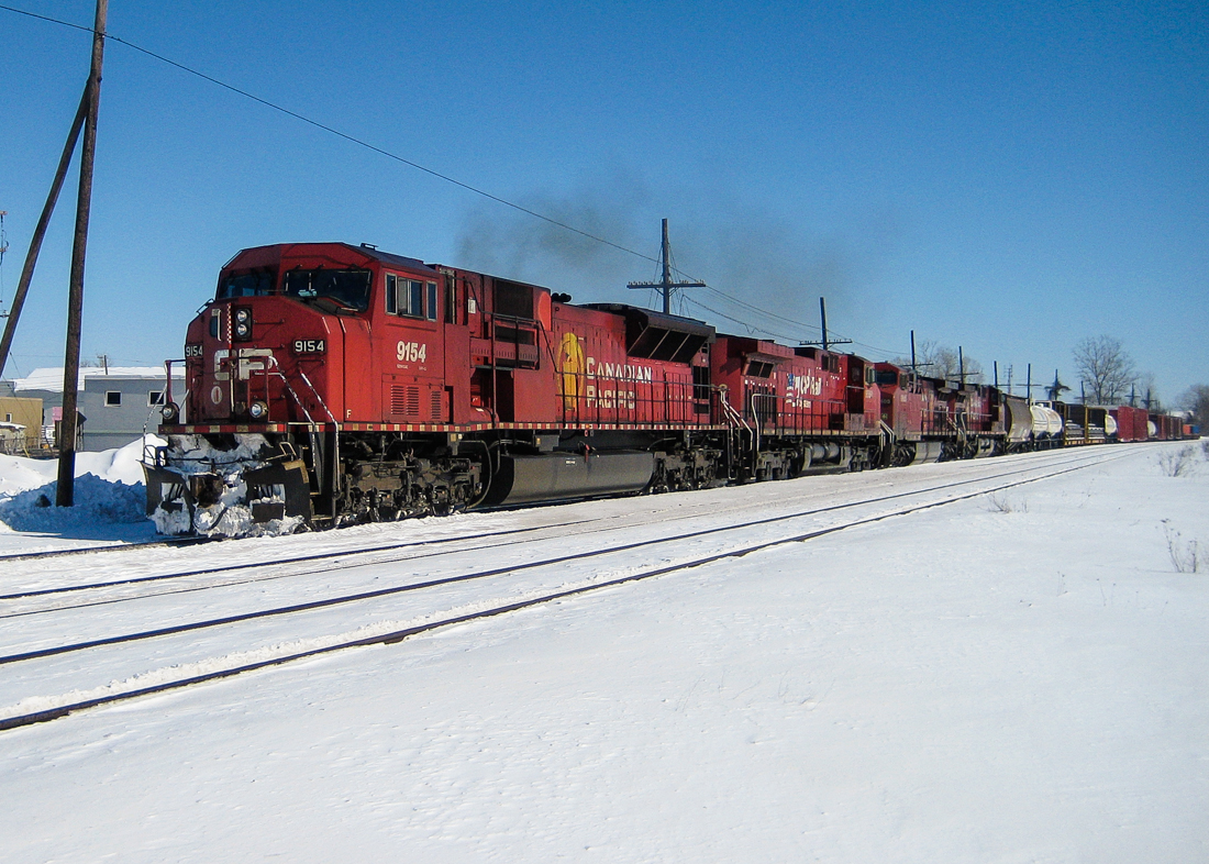 CP 9154, CP 9568, CP 9605 & CP 9826 head west through Dorval in the winter of 2008 with a very short train. For more train photos, check out http://www.flickr.com/photos/mtlwestrailfan/