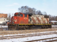 CN #580's power, GP38 #4774, coasts towards the eastern end of the Brantford Yard.
