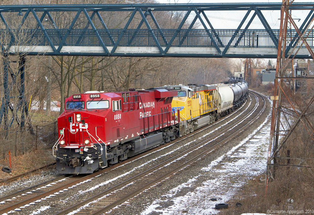 FPON mania has suddenly gripped the GTA, and this CP 609 is no exception. CP 8958 leads an American cousin UP 5501 past Rosedale.