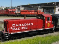 Public Canada day activities at Ogden yard. CP SW900 6711 was pulling a old baggage car, coach and caboose for short back and forth rides in the yard. CP 2816 also made an appearance. Note the old C424 control cab in the backround, #1100. 