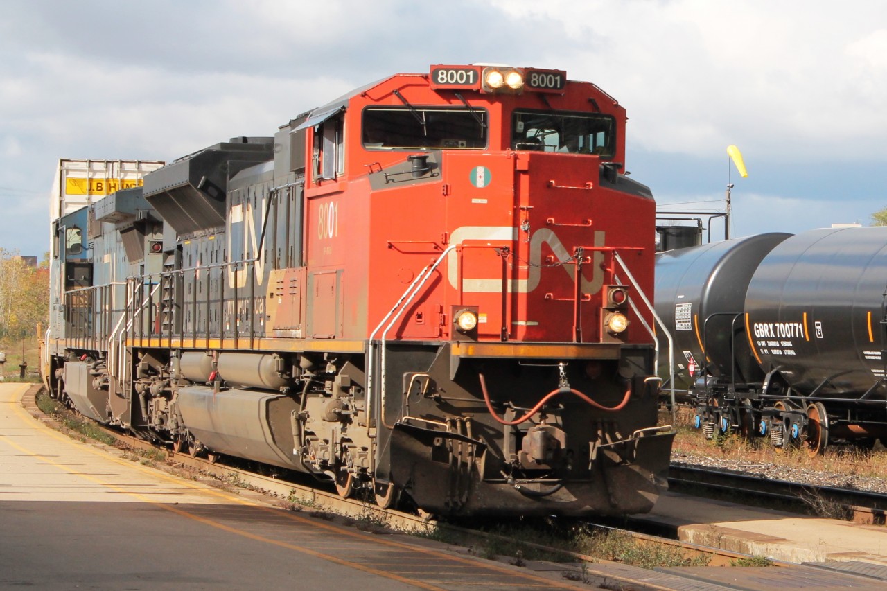 Eastbound Intermodal passing through Brantford station.