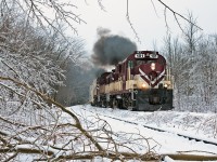 The sound of MLW's fill the morning air coupled with the sound of ice and tree branches falling all around, the extra road switcher marches northwards to Guelph. Thanks for the smoke show Bruce ! 