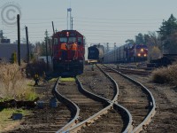 <b>Having a smoke and coffee on the front porch</b> as CP Train 147 goes by on the mainline - the Streetsville Turn is held up by a Maintenance of Way crew doing work on the Owen Sound spur.