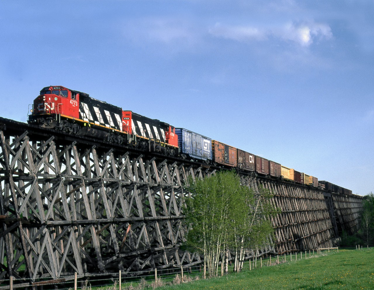 Whitecourt bound wayfreight from Edmonton crosses the Paddle River east of Mayerthorpe on a long wooden matchstick trestle