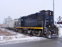 In heavy snow the weekly delivery of hoppers to Growmark, Fertilizer Rd, Delhi. This is the furthermost point east on the line.