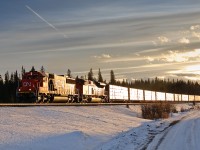 CN SD60 5478 and SD70M-2 8832 climb through Pedley, AB with 8971' of M348 as the sun casts its final (and only rays) of the day.