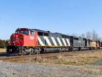 Toronto, ON - UP Salem, IL train M39931 04 prepares to slam across CP's Windsor Sub at Melrose behind a wild consist of CN SD60F 5521, IC SD40-2 6128 and WC GP40-2 3026 (in the Wisconsin map scheme).