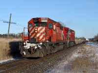 CP SD40-2 5625 and AC4400CW 8634 hustle Montreal-Toronto East train 121-12 west through Newcastle, ON.