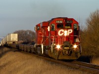 CP SD40-2 5633 and ES44AC 8713 lift eXpressway train 121-21 out of Bowmanville, Ontario speeding west on the Belleville Sub.