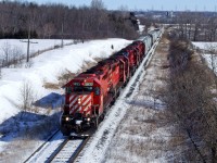 CP SD40-2s 5833, 6035, 5662, GP38-2 3031 and SD40-2s 5674 and 6034 hustle St Luc-Toronto train 235-24 west between Port Hope and Lovekin on CP's Belleville Subdivision.
