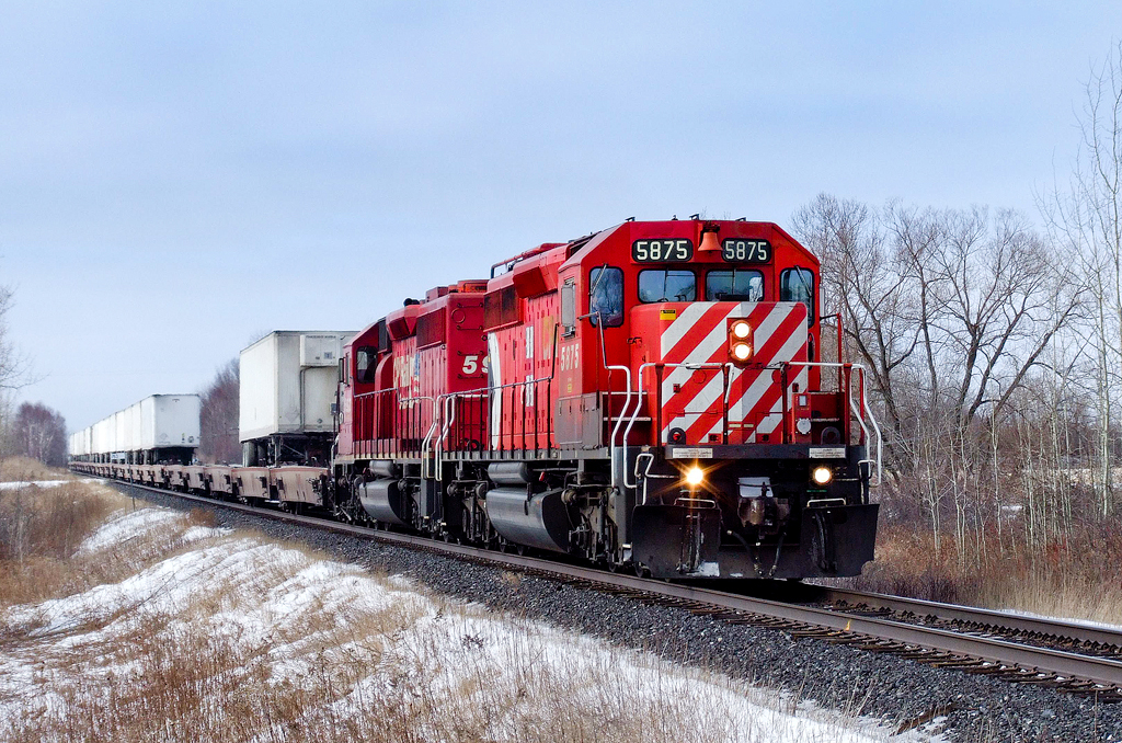 Classic CP SD40-2s 5875 and 5933 hustle Toronto East-St. Luc train 122-09 east on the Belleville Sub.
