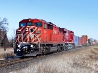CP SD40-2F 9019 hustles Montreal-Detroit train 159-06 west on CP's Belleville Subdivision approaching Lovekin.