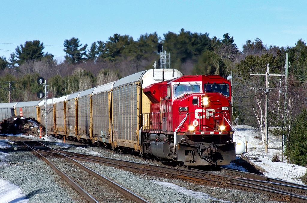 CP SD9043AC 9119 has just taken the light at Boyne on CN's Bala Sub and will re-enter home rails at Reynolds on CP's Parry Sound sub shortly, leaving the Directional Run Zone. Behind the 9119S were 75 empty autoracks making up as required Calgary-Toronto train 794-14.