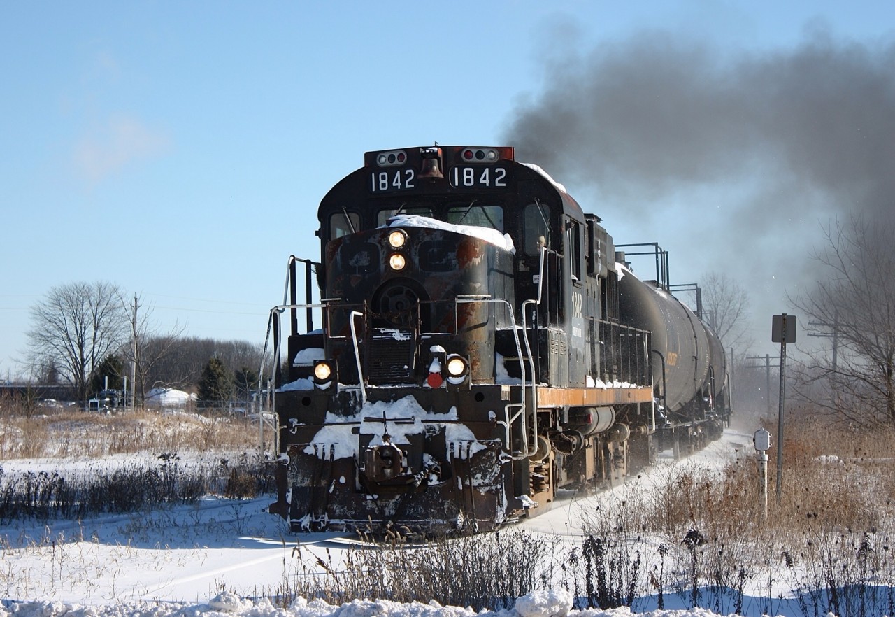 St Thomas & Eastern is in its last week of operations, and is seen excellerating out of Alymer after working the ethanol facility.
