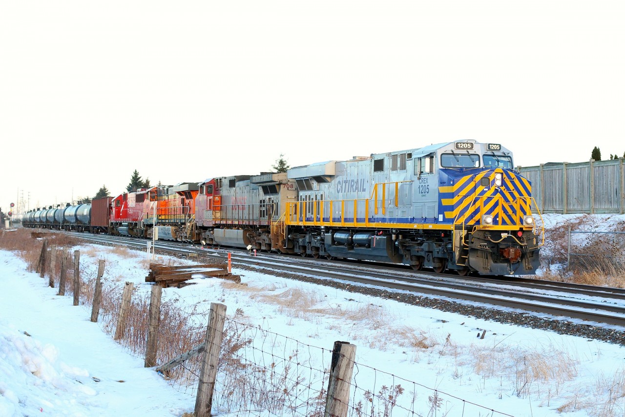 Ordered for 11:00 train 643 would not arrive at Lisgar GO station till 16:30 but would be well with the wait as rumours of rotating the power never proved true. CREX 1205 leads a pair of BNSF units and former SOO SD60 6241.