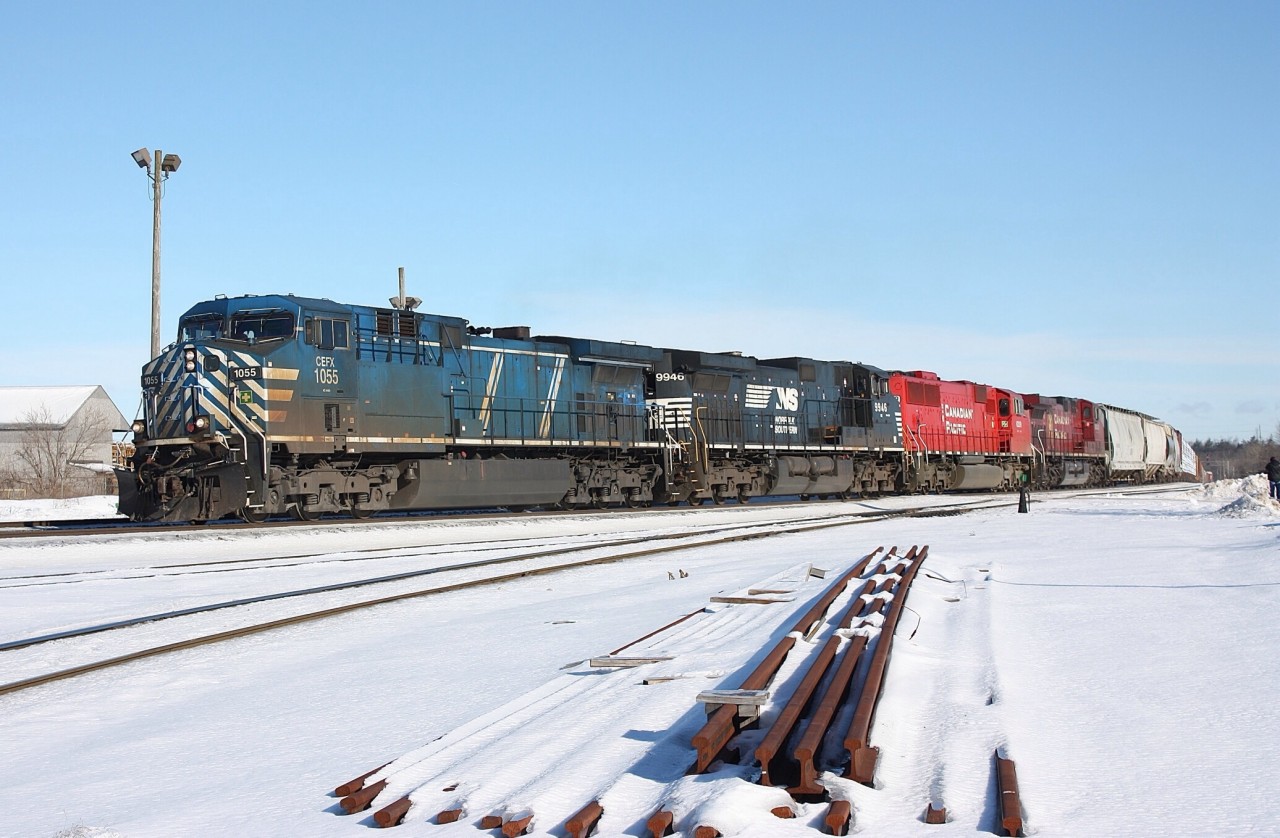 CP train 243 was caught by the hot box detector at mile 25 and finally made it to the Jct a hour later with a lash up worth waiting for. CEFX 1055 leads NS 9946, ex SOO SD60M 6259 and a CP AC4400.