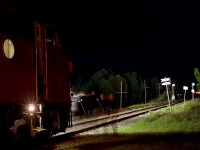 The ghostly movements of engineers D. Wood and W. Sykes are caught on a long exposure as they figure out the easiest way to take off a dangling MU cable from the nose of the 2002.  Neither a safe nor easy task.

Of note:  Both these men have recently retired after long careers with the ONR.  They also had the honour of running the last southbound Northlander (698) into Toronto on September 28, 2012.