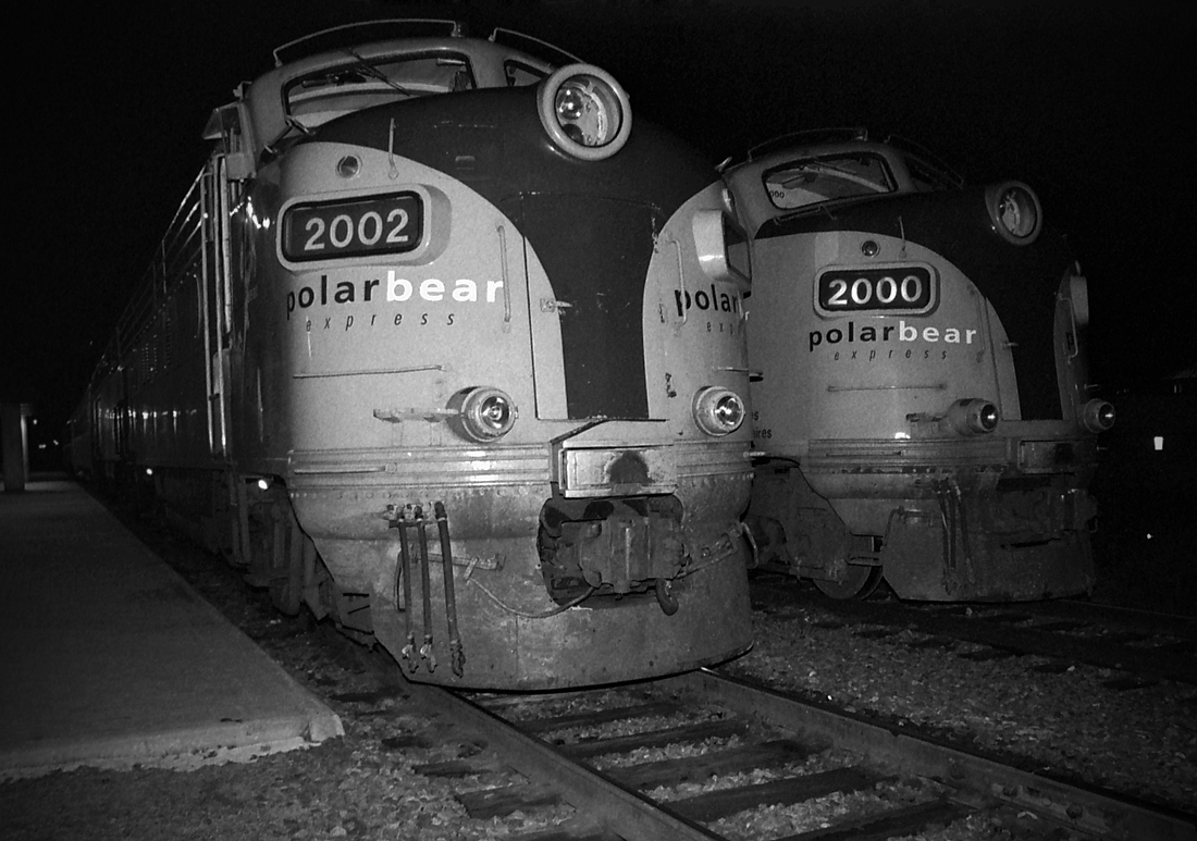 Having just brought 697 north from Toronto, the 2002 will become the Northlander's trailing unit as 2000 is prepped to move off the siding and then onto the nose of 2002.  A regular occurrence when this train was on this schedule, a crew would bring a unit from the shop (it was needed up north) and leave it in the siding for the evening train which was due in at 2315 and departed at 2335.  Enough time for a quick brake test and splash of fuel.  Winter time was another story, though.

Date is approximate.