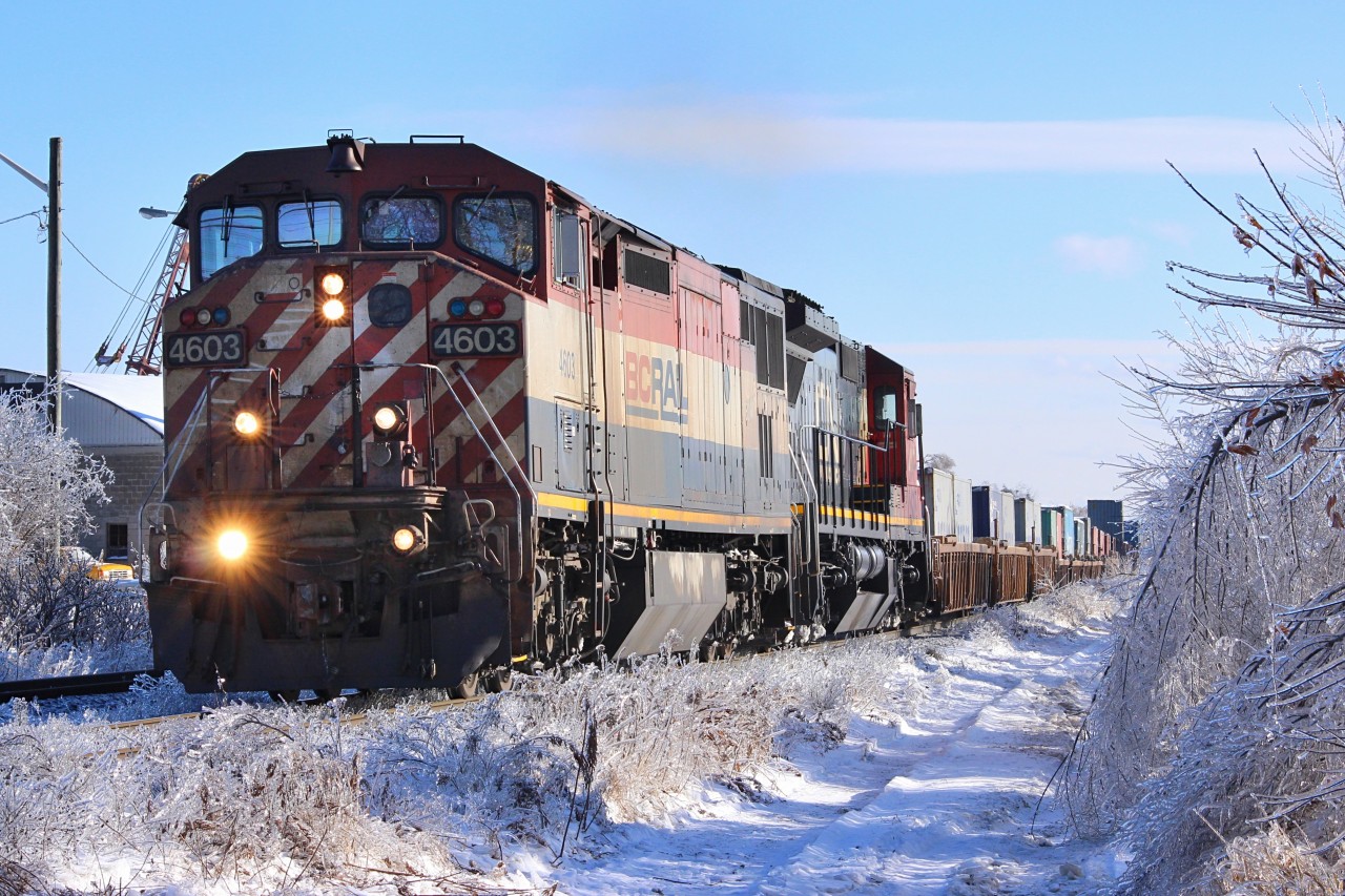 After Ontario's brutal ice storm and a few days without power, I finally made my way to the CN Bala subdivision to photograph the beautiful sight of everything iced up with trains of course! This is CN 105 on the approach to Langstaff GO Station.