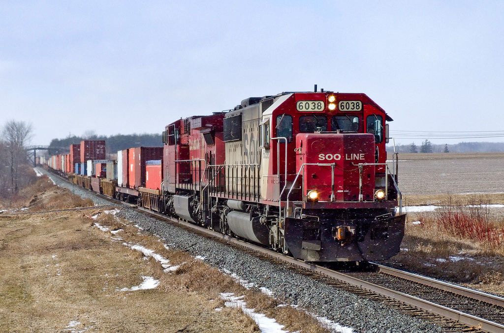 SOO SD60 6038 and CP AC4400CW 9597 speed east on CP's Belleville Sub with Detroit-Montreal train 158-16.