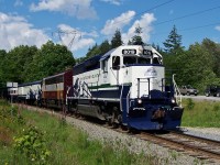 GP40-2 8019 and leased West Coast Railway Association FP7 4069 head south from Squamish with the southbound Whistler Mountaineer.