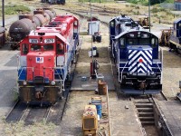 One month after the SRY take over of operations on Vancouver Island SRY 119 and 110 share the engine terminal with ENR GP 38-2s 3870 and 3809.