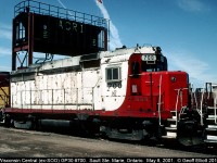 Looking a little worse for wear Wisconsin Central GP30 #700 is the mid-unit of a trio that came into Sault Ste. Marie on the morning of May 8, 2001.  No mistaking the SOO LINE heritage of the unit in this case.  WC 700 later was donated to the Lake Superior Railroad Museum in Duluth, MN and has since been restored to her former SOO Line beauty, but it's hard to believe how bad it looked in 2001.  Here is a link to the 700 working for the Museum to store empty hoppers.... http://www.railpictures.net/viewphoto.php?id=276116&nseq=50