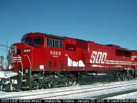 SOO LINE SD60M #6062 is lead on a westbound container train that has been sitting in Walkerville for a couple of days now.  You can see that the temperature has been fluctuating as the fuel tank is frozen to the tracks with icicles!!!