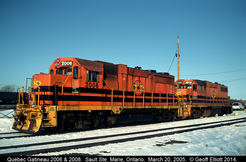 Before the ex-CN GP40-2W widecab units were the 'norm' on the Huron Central, power from various G&W lines would show up in the Sault.  It's early morning and for today's eastbound train we have Quebec Gatineau GP35m's #2006 and 2008 waiting on the pad for a crew to get things rolling.