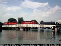 CP 6064 and 5647 continue their trek north to Sarnia with CSX bound traffic as they cross the C&O swing bridge in Wallaceburg, Ontario.