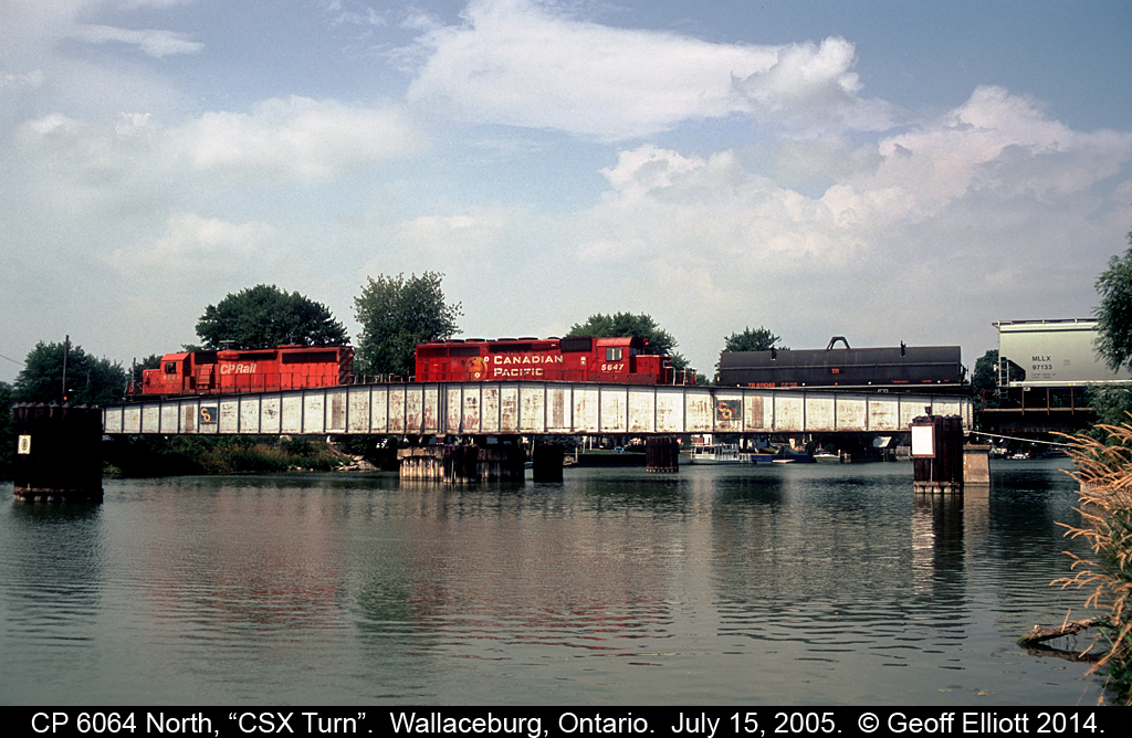 CP 6064 and 5647 continue their trek north to Sarnia with CSX bound traffic as they cross the C&O swing bridge in Wallaceburg, Ontario.
