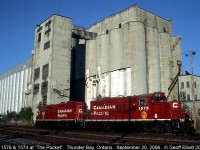 Canadian Pacific GP9's #1576 and 1574 rest in "the pocket" between yard duties in the Thunder Bay terminal.
