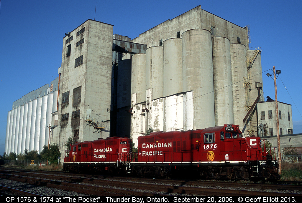 Canadian Pacific GP9's #1576 and 1574 rest in "the pocket" between yard duties in the Thunder Bay terminal.