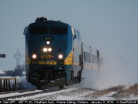 VIA train #71, with P42DC #911 at the helm, kicks up the snow as it passes MP 71.20 on the VIA Chatham Subdivision on January 8, 2014.