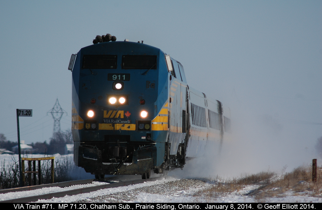 VIA train #71, with P42DC #911 at the helm, kicks up the snow as it passes MP 71.20 on the VIA Chatham Subdivision on January 8, 2014.
