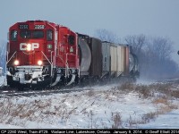 CP GP20C-ECO #2260 leads local T29 as kicks up a little snow on it's way back to Windsor after having performed all of their duties in and around the Chatham area for January 9, 2014.
