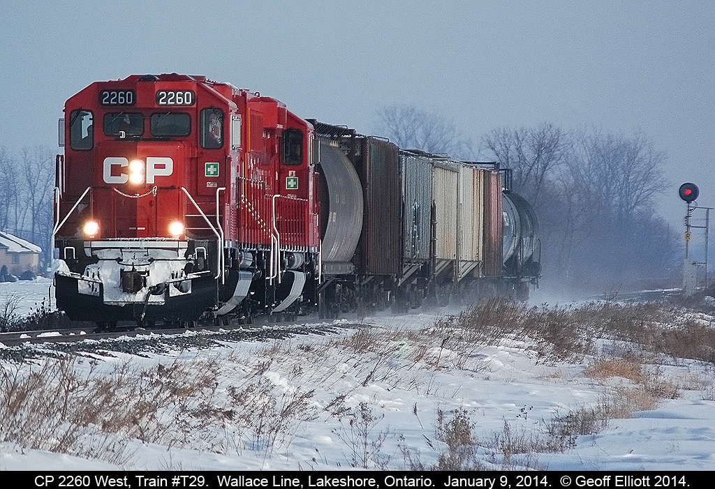 CP GP20C-ECO #2260 leads local T29 as kicks up a little snow on it's way back to Windsor after having performed all of their duties in and around the Chatham area for January 9, 2014.