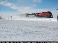 CP 9658 leads 242-26 around the curve in Tilbury, following shortly behind 2263 east, train T-29.  242 had signal issues as well and was stopped in Belle River for a while before the signals finally cleared up for them.