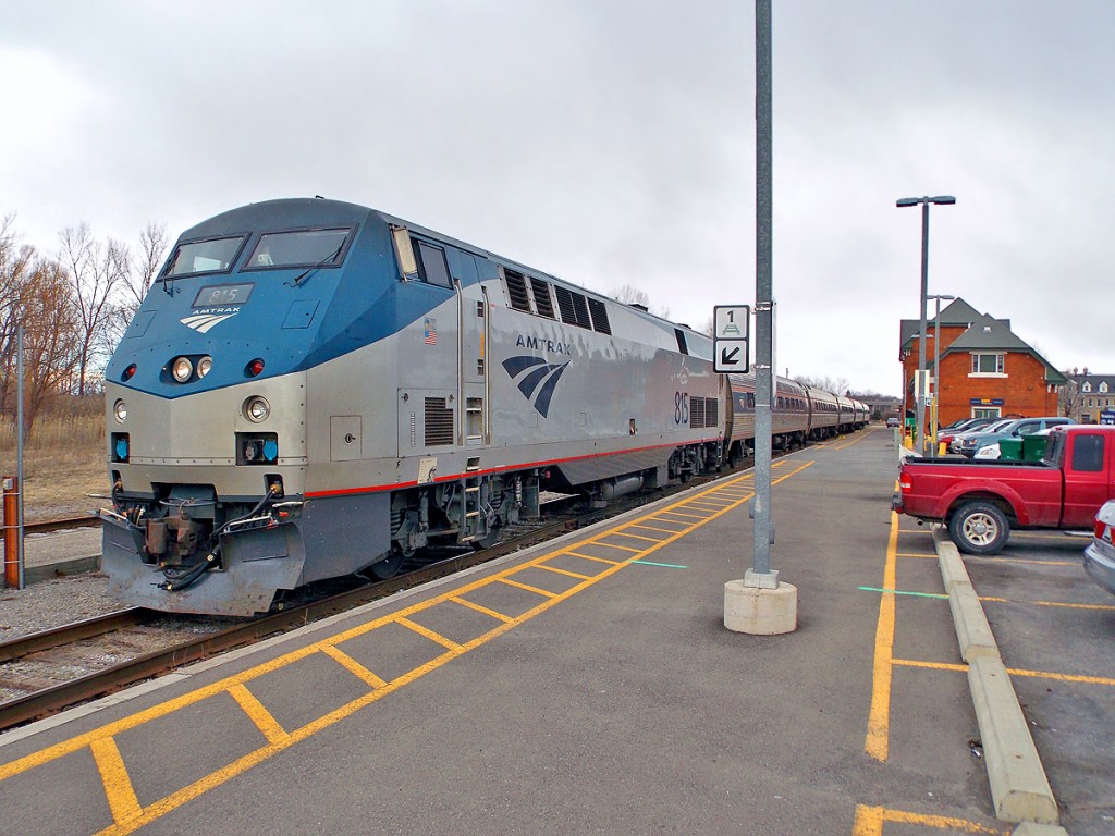 Amtrak's Maple Leaf. Ready to depart Niagara Falls, ON for Toronto. P40DC #815 on the point. The last remaining passenger intercity passenger rail service between Toronto & Niagara Falls. The fact we can still ride this train today is all courtesy of a small group of professionals & university grads known as the National Association of Railroad Passengers whose forebears, despite daunting odds, were responsible for the creation of Amtrak under the Nixon administatrion. Those who love train travel thank their can-do attitude.
Hiawatha Pete.  http://northamericabyrail.info