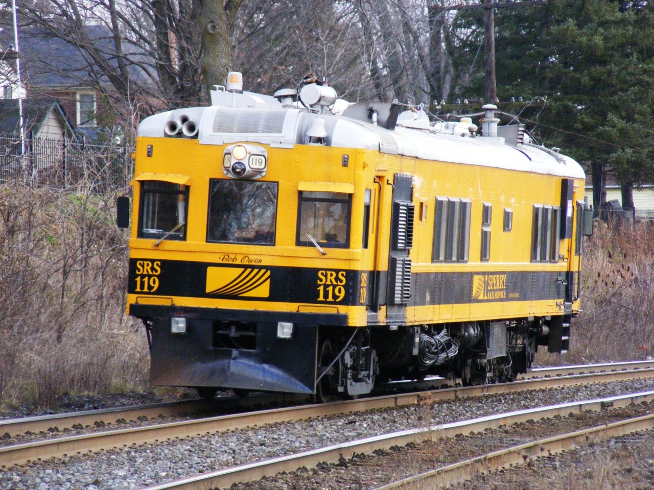 Sperry Rail Services Railcar 119 "Bob Owen" waits for an eastbound on the curve at Paris Junction.
